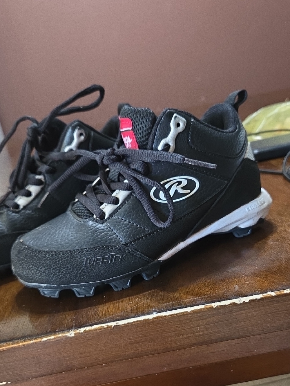 Rawlings Black Kids Turf/Field Cleats with Red Tongue Accent